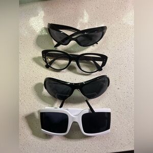 Four pairs of sunglasses